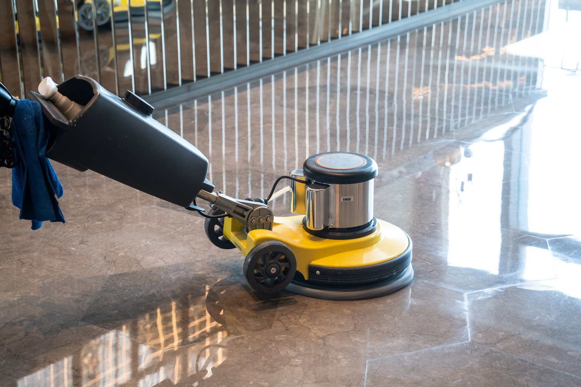 Marble floor polishing in progress on a polished marble floor in Raleigh North Carolina