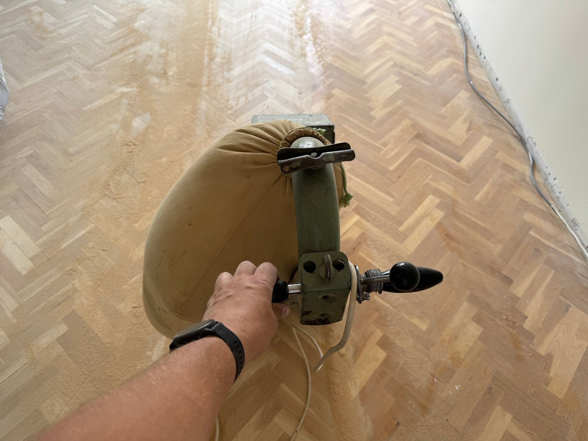 Technician polishing a marble floor during a marble restoration project in Richmond, Virginia